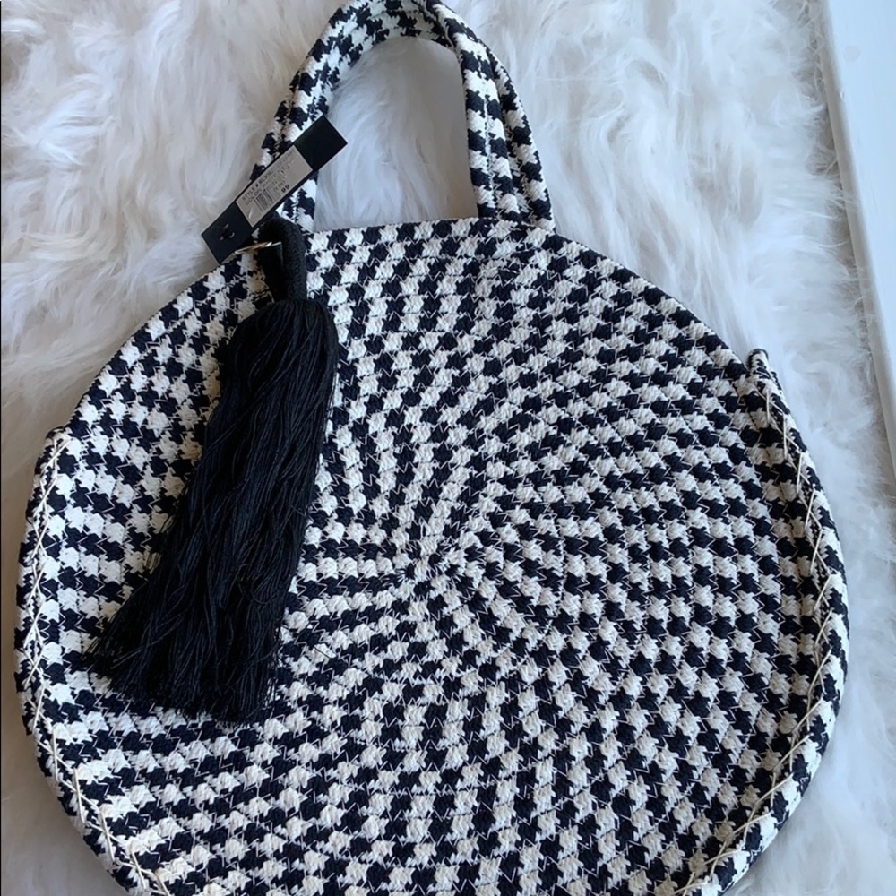 Brand new White and Navy round tote with tassel!